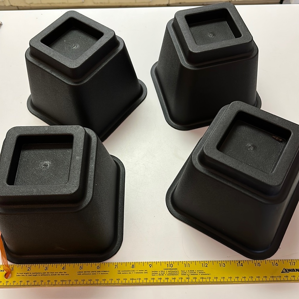 Large set of 4 black risers for bed, table. Create more storage space taller